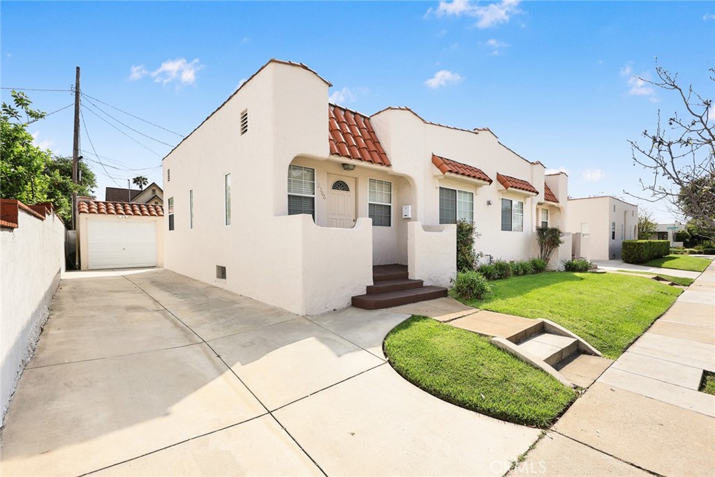 2306 Alhambra Road Alhambra, CA 91801 - Photo 25 of 29 a front view of a house with a yard
