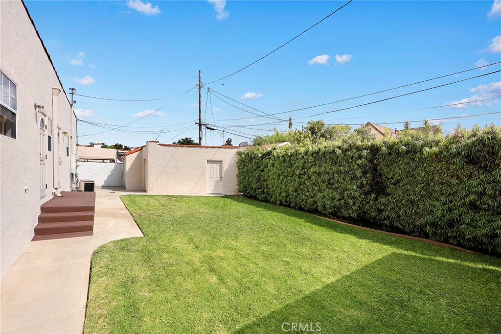 2306 Alhambra Road Alhambra, CA 91801 - Photo 28 of 29 a front view of a house with a garden