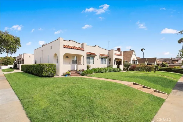 a view of a house with a big yard
