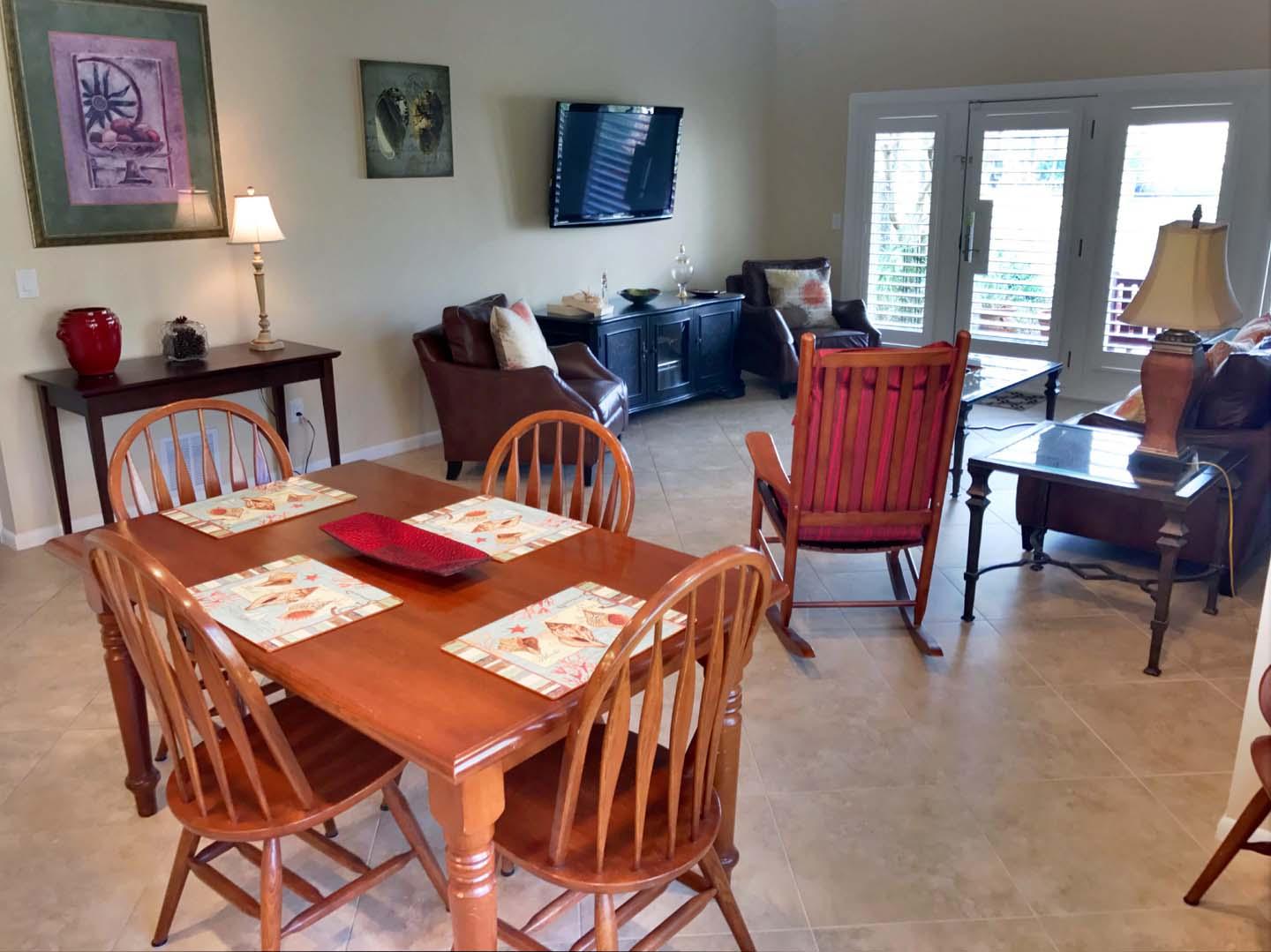 5073 Beachwalk Way Miramar Beach, FL 32550 - Photo 13 of 61 a view of a dining room with furniture and a large window