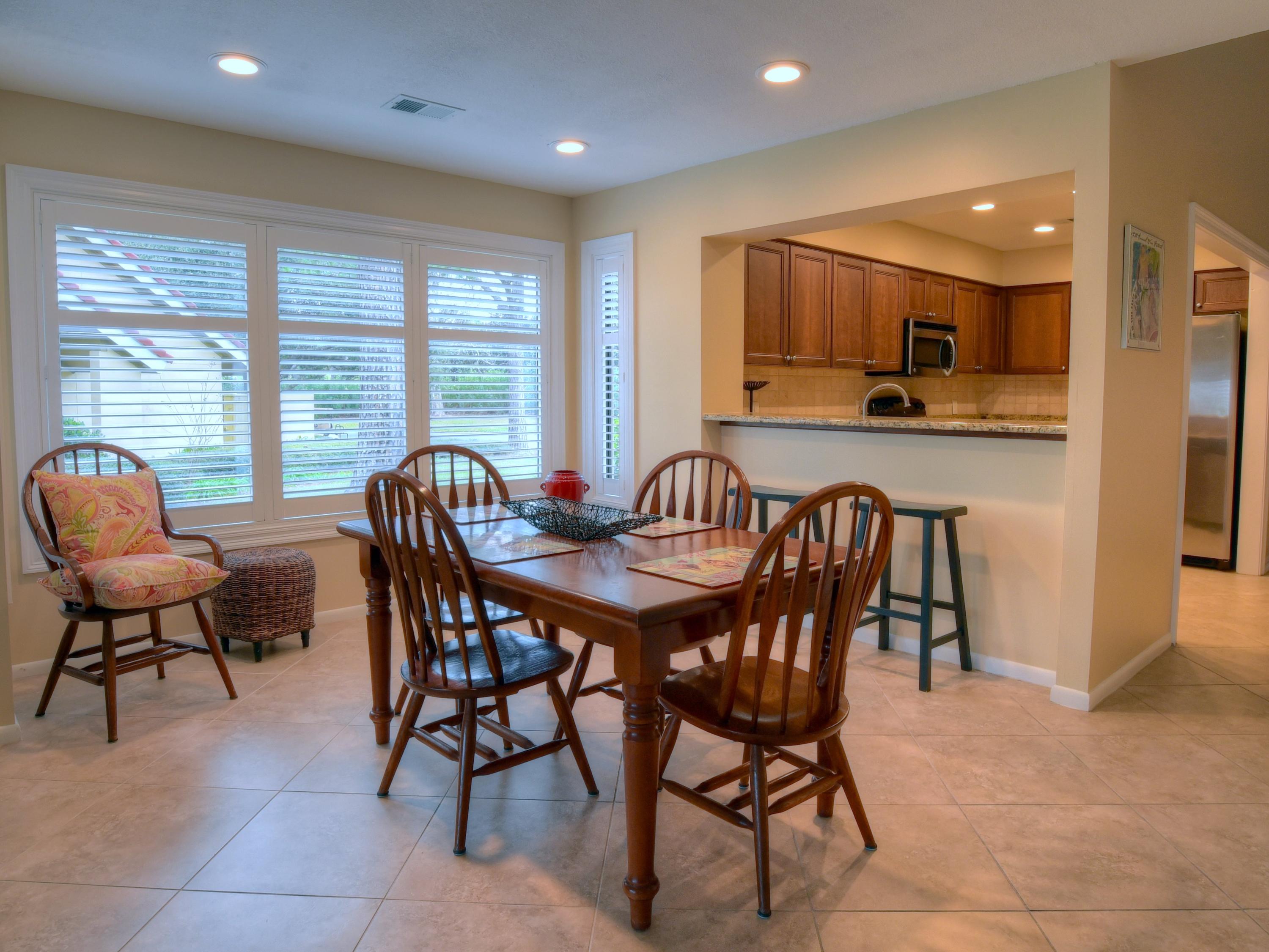 5073 Beachwalk Way Miramar Beach, FL 32550 - Photo 15 of 61 a view of a dining room with furniture window and outside view