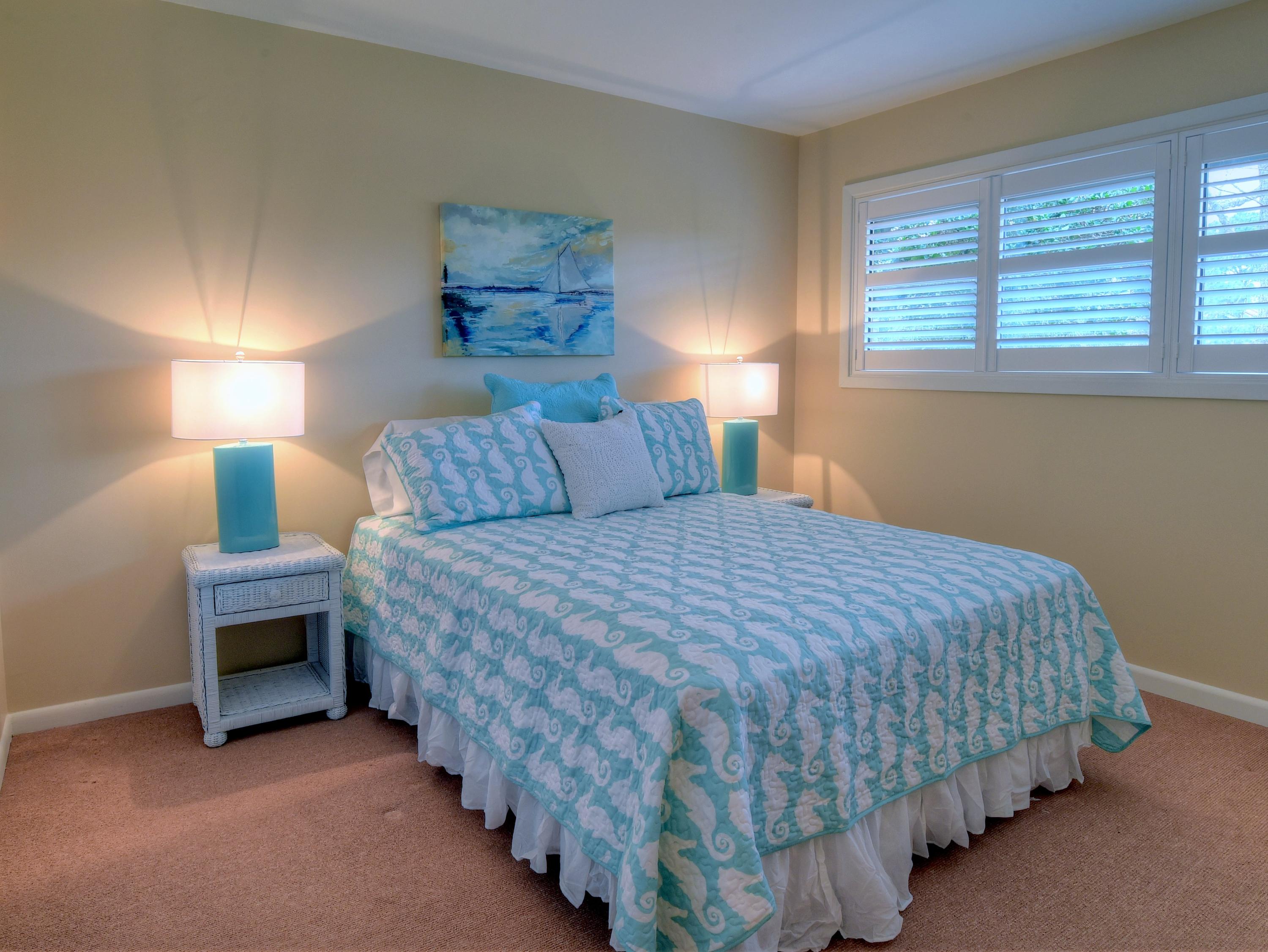 5073 Beachwalk Way Miramar Beach, FL 32550 - Photo 22 of 61 a bedroom with bed and lamp