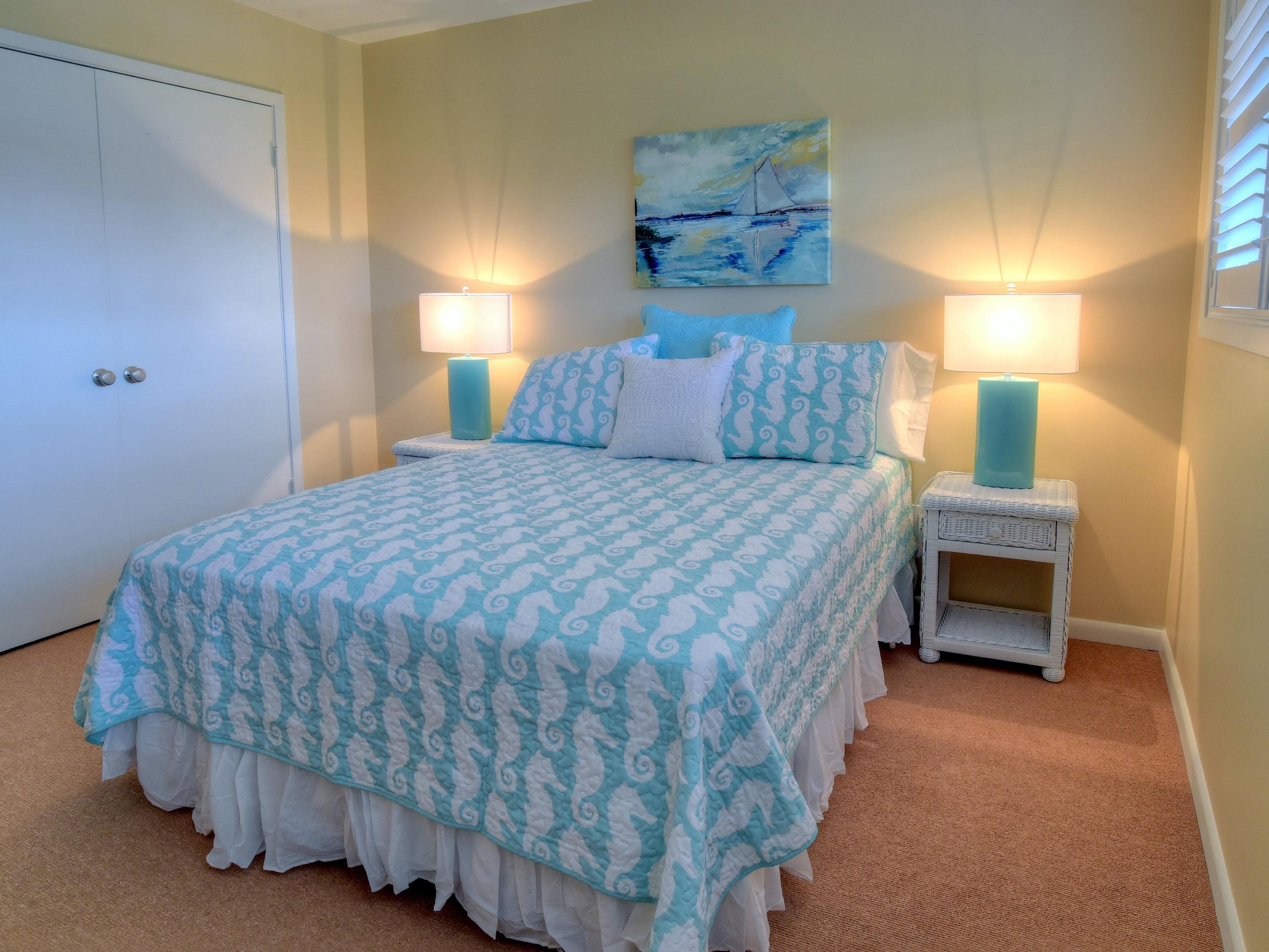 5073 Beachwalk Way Miramar Beach, FL 32550 - Photo 24 of 61 a bedroom with a bed and a lamp