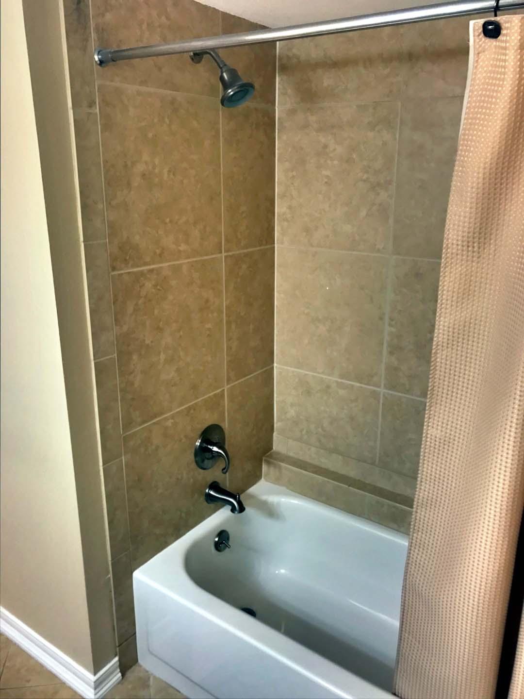 5073 Beachwalk Way Miramar Beach, FL 32550 - Photo 27 of 61 a bathroom with a tub and a shower