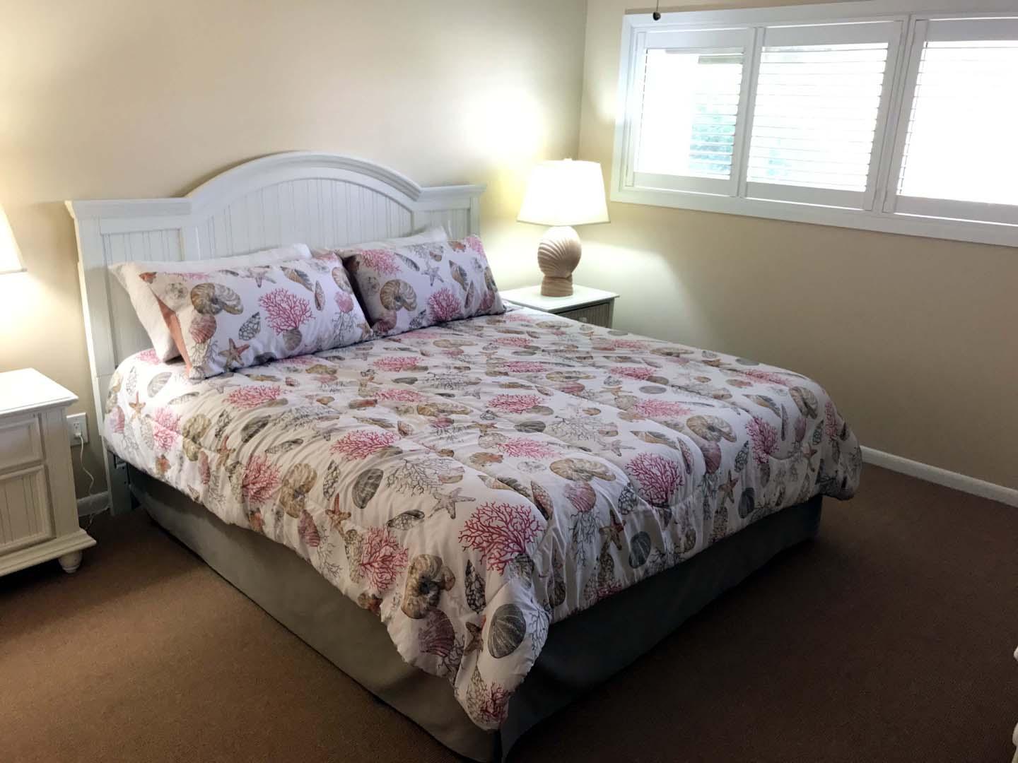 5073 Beachwalk Way Miramar Beach, FL 32550 - Photo 39 of 61 a bed sitting in a bedroom next to a window