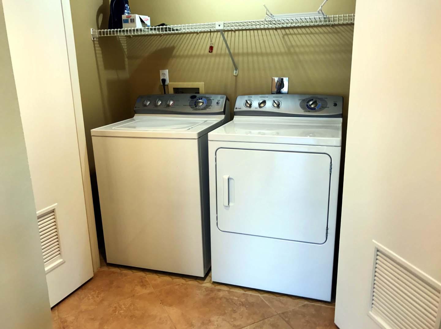 5073 Beachwalk Way Miramar Beach, FL 32550 - Photo 45 of 61 a utility room with dryer and washer
