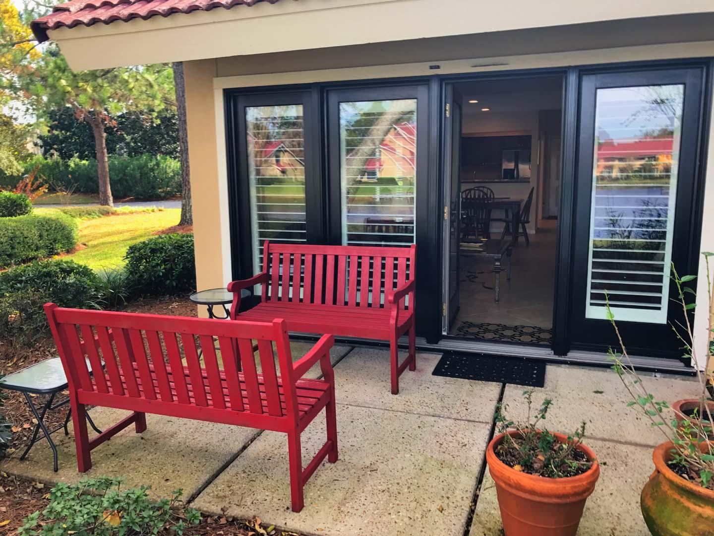 5073 Beachwalk Way Miramar Beach, FL 32550 - Photo 50 of 61 a red chair sitting in front of a house