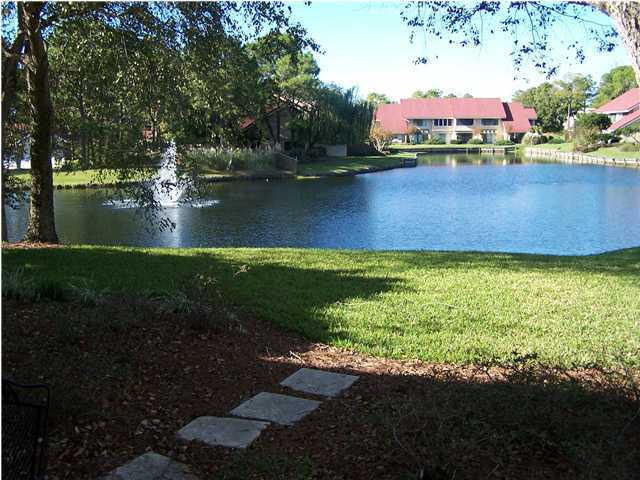 5073 Beachwalk Way Miramar Beach, FL 32550 - Photo 52 of 61 a view of a lake with houses