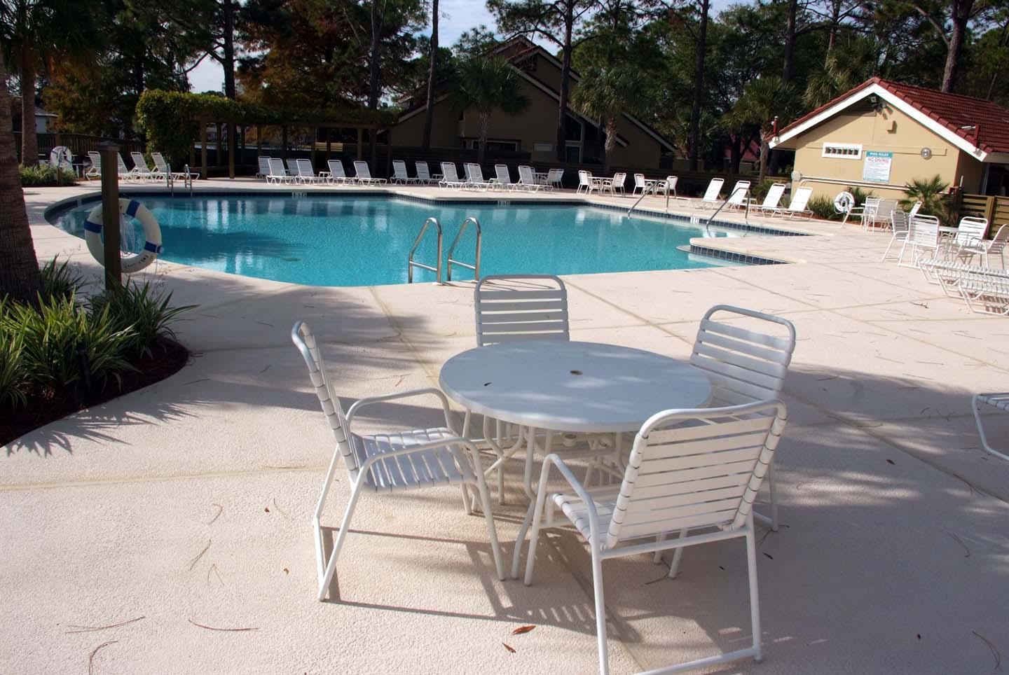 5073 Beachwalk Way Miramar Beach, FL 32550 - Photo 58 of 61 a view of house with garden and lake view