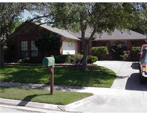 4217 Nicklaus Lane Corpus Christi, TX 78413 - Photo 1 of 7 a front view of house with yard and green space