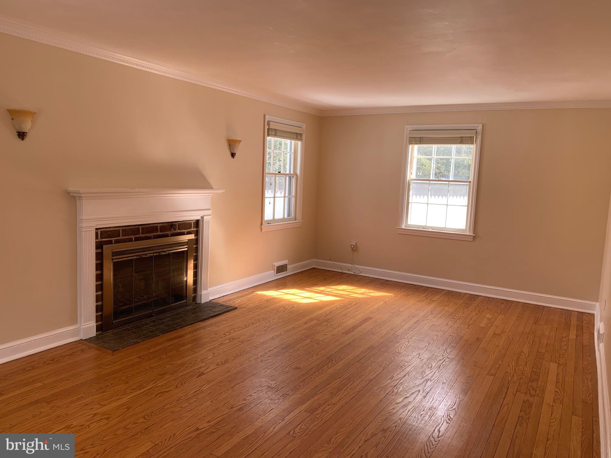 7807 Glenbrook Road Bethesda, MD 20814 - Photo 4 of 25 Living room spans depth of home