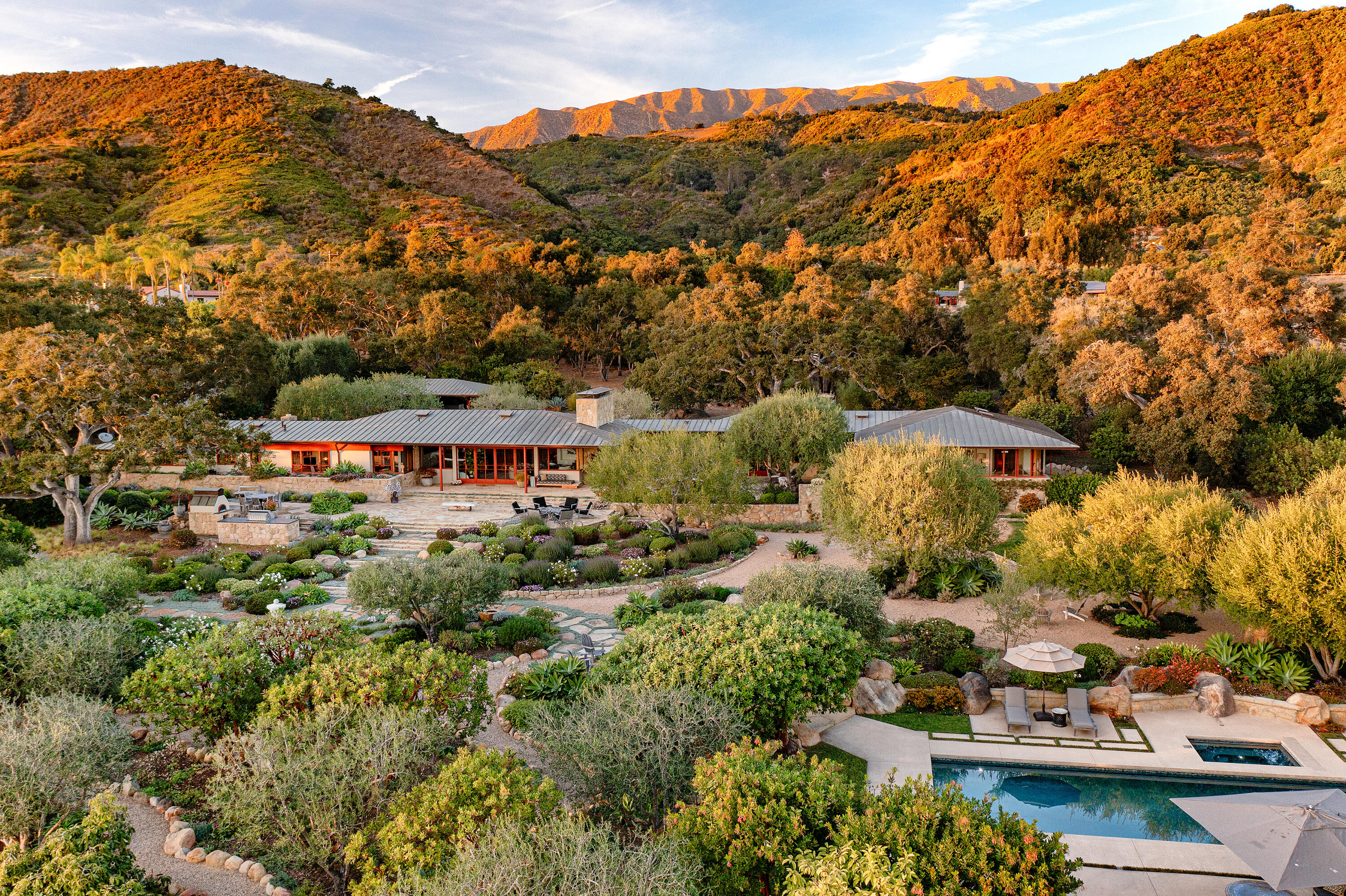 an aerial view of a house with a garden