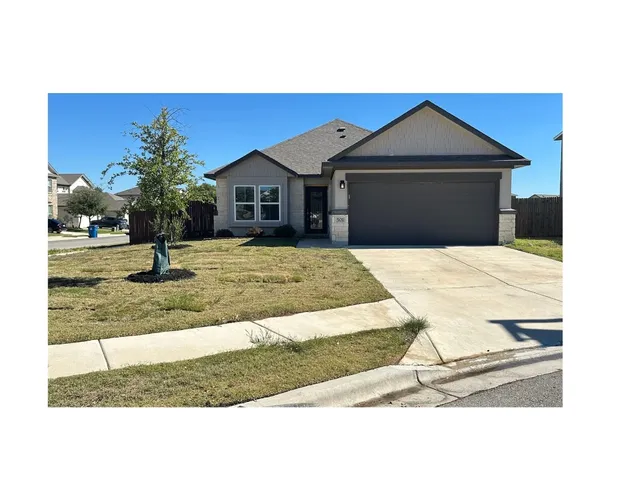 a house view with a outdoor space