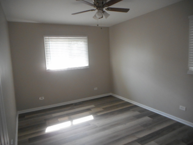 1860 Ashley Road Hoffman Estates, IL 60169 - Photo 14 of 27 an empty room with a window