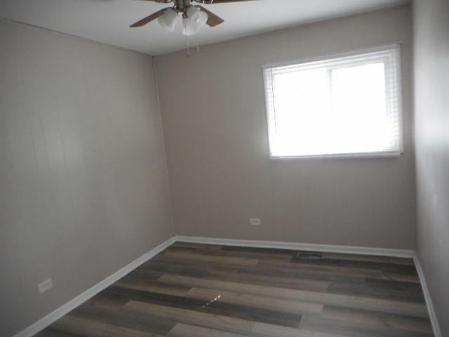 1860 Ashley Road Hoffman Estates, IL 60169 - Photo 15 of 27 a view of an empty room with a window