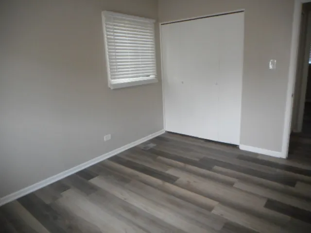 a view of a room that has a window