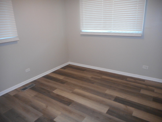 1860 Ashley Road Hoffman Estates, IL 60169 - Photo 19 of 27 a view of a room that has a window