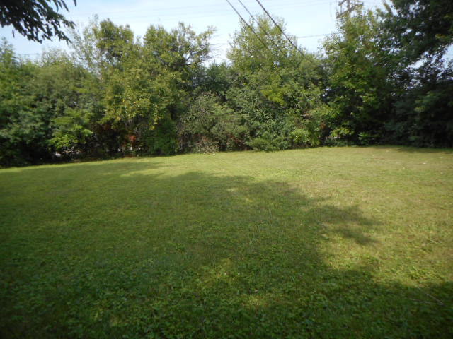 1860 Ashley Road Hoffman Estates, IL 60169 - Photo 2 of 27 a view of a field with an trees