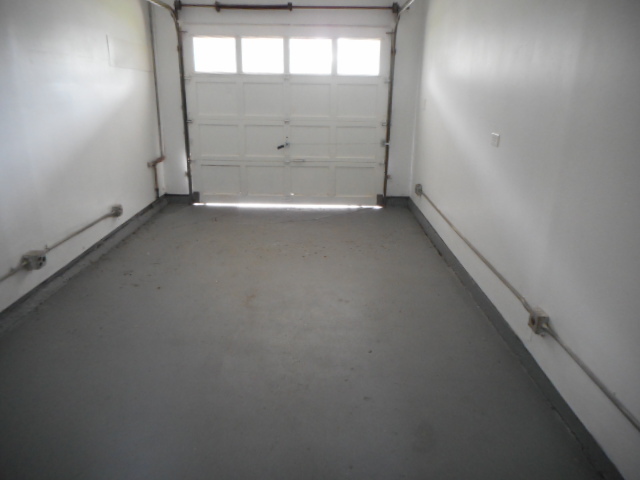 1860 Ashley Road Hoffman Estates, IL 60169 - Photo 26 of 27 an empty room with a empty space and windows