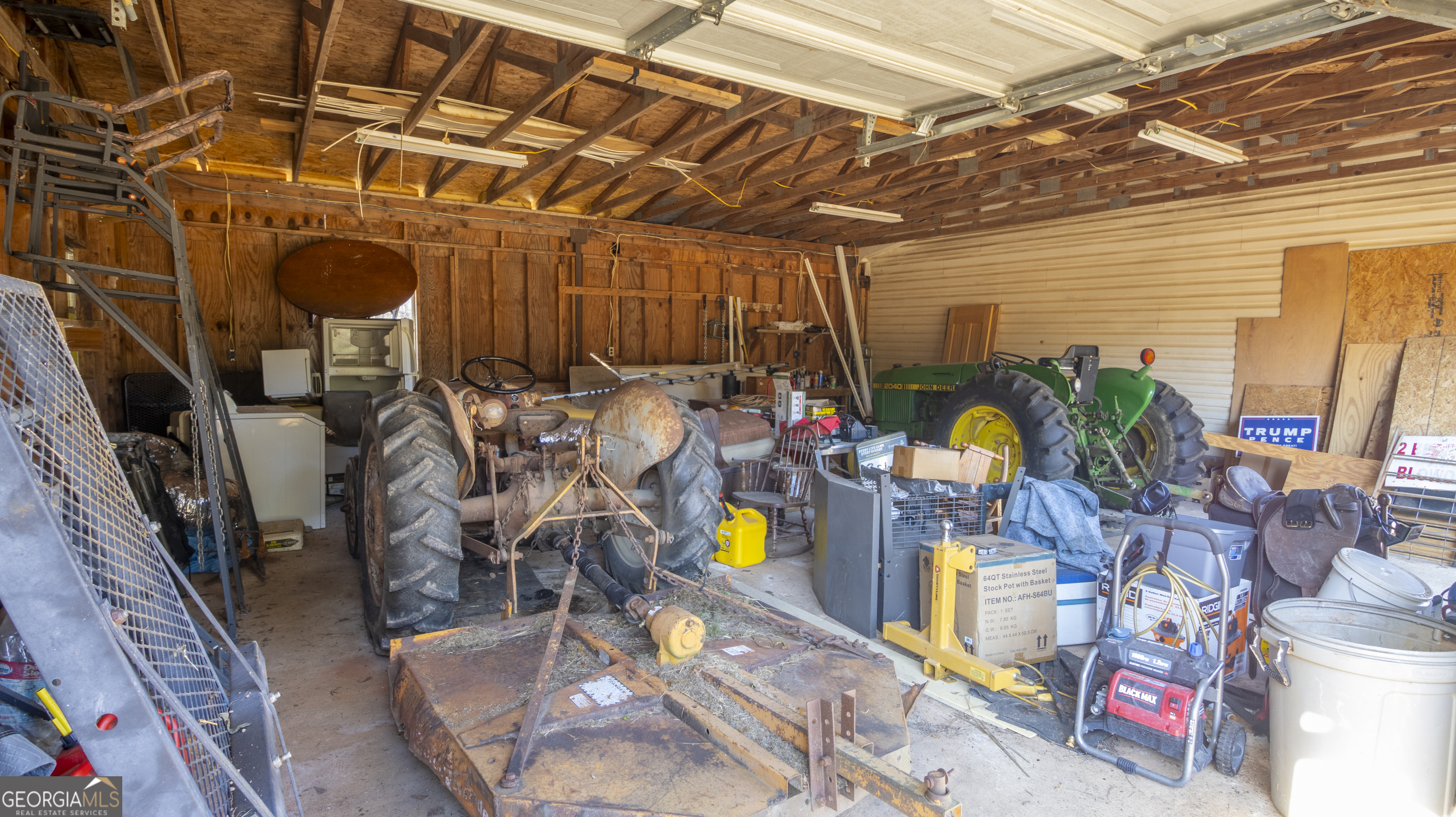 2717 Mount Pilgrim Road Greenville, GA 30222 - Photo 36 of 65 a view of a storage room with washer and dryer
