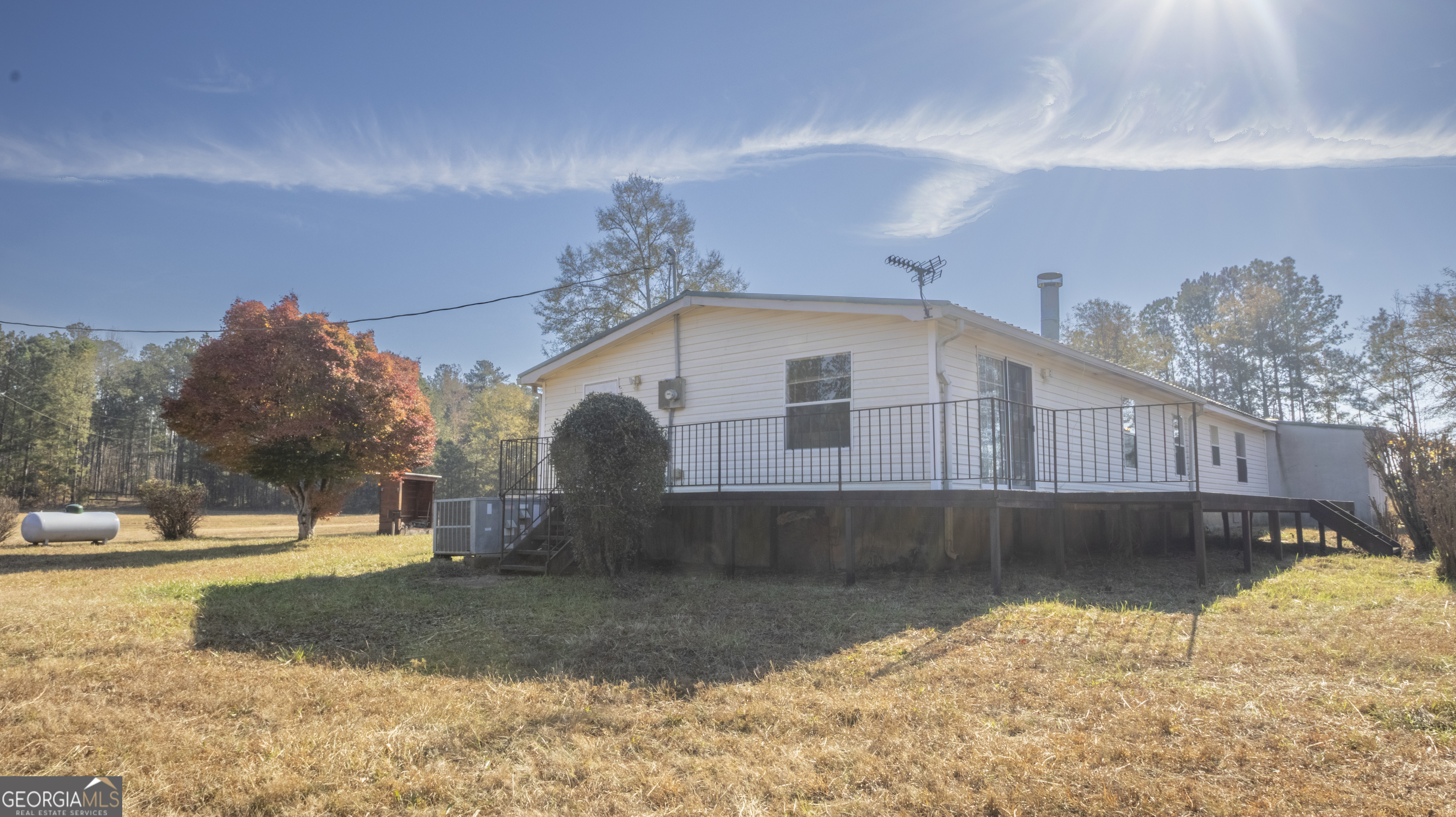 2717 Mount Pilgrim Road Greenville, GA 30222 - Photo 38 of 65 a view of a house with snow on the road