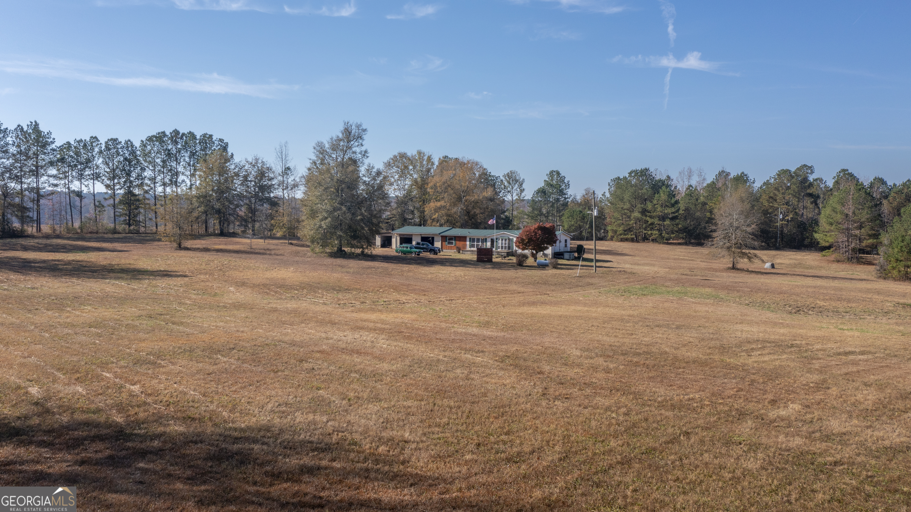 2717 Mount Pilgrim Road Greenville, GA 30222 - Photo 47 of 65 a view of a road with a building in the background