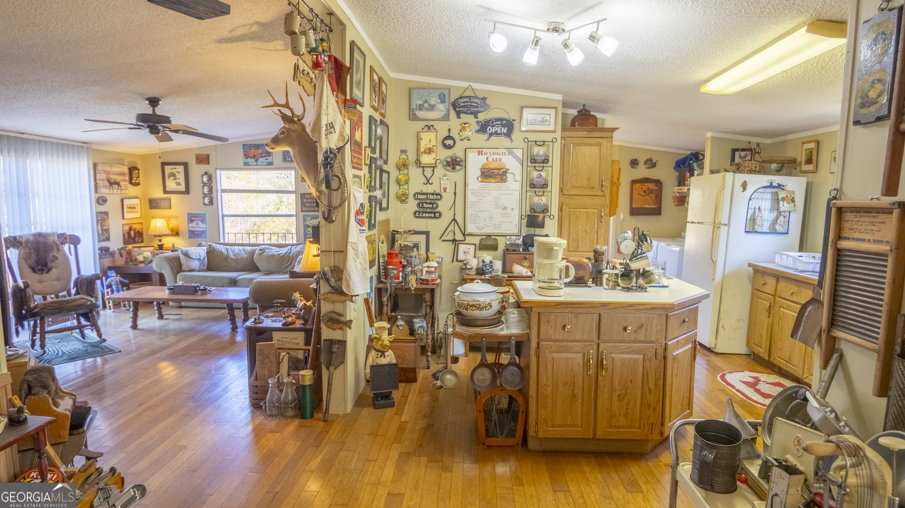 2717 Mount Pilgrim Road Greenville, GA 30222 - Photo 8 of 65 a very nice looking living room with wooden floor and furniture