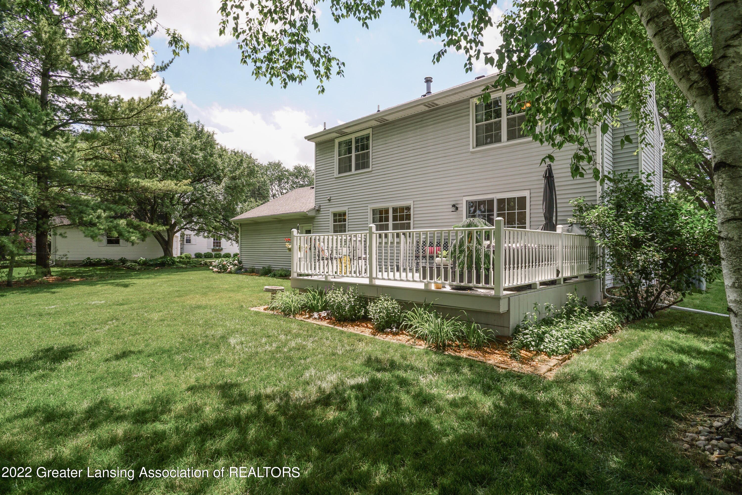 945 Kingsbridge Road Grand Ledge, MI 48837 - Photo 53 of 57 Rear elevation 1