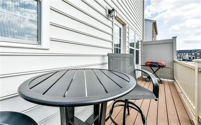 a view of a house with a parking space