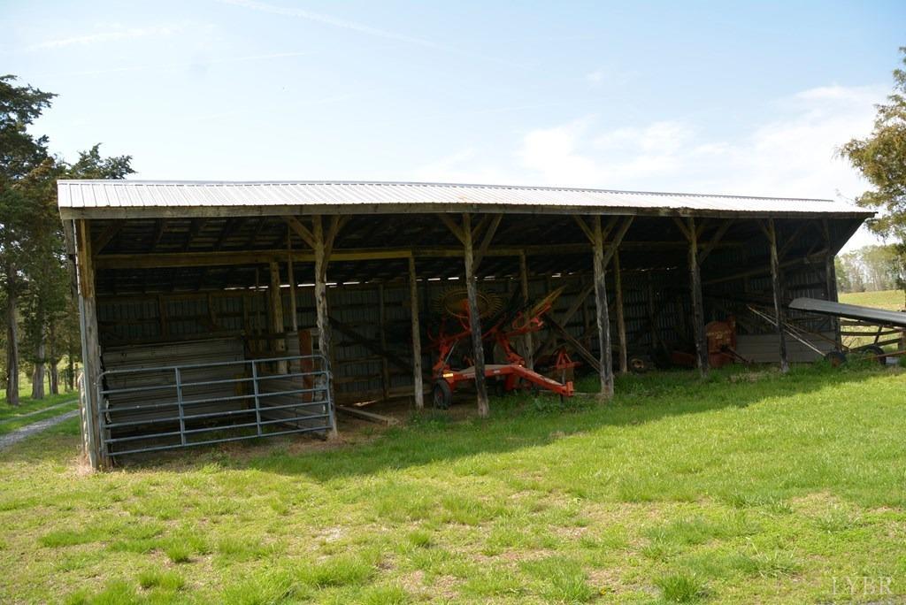 0 Cedar Lane Farmville, VA 23901 - Photo 6 of 13 a view of a chair and table in backyard of house