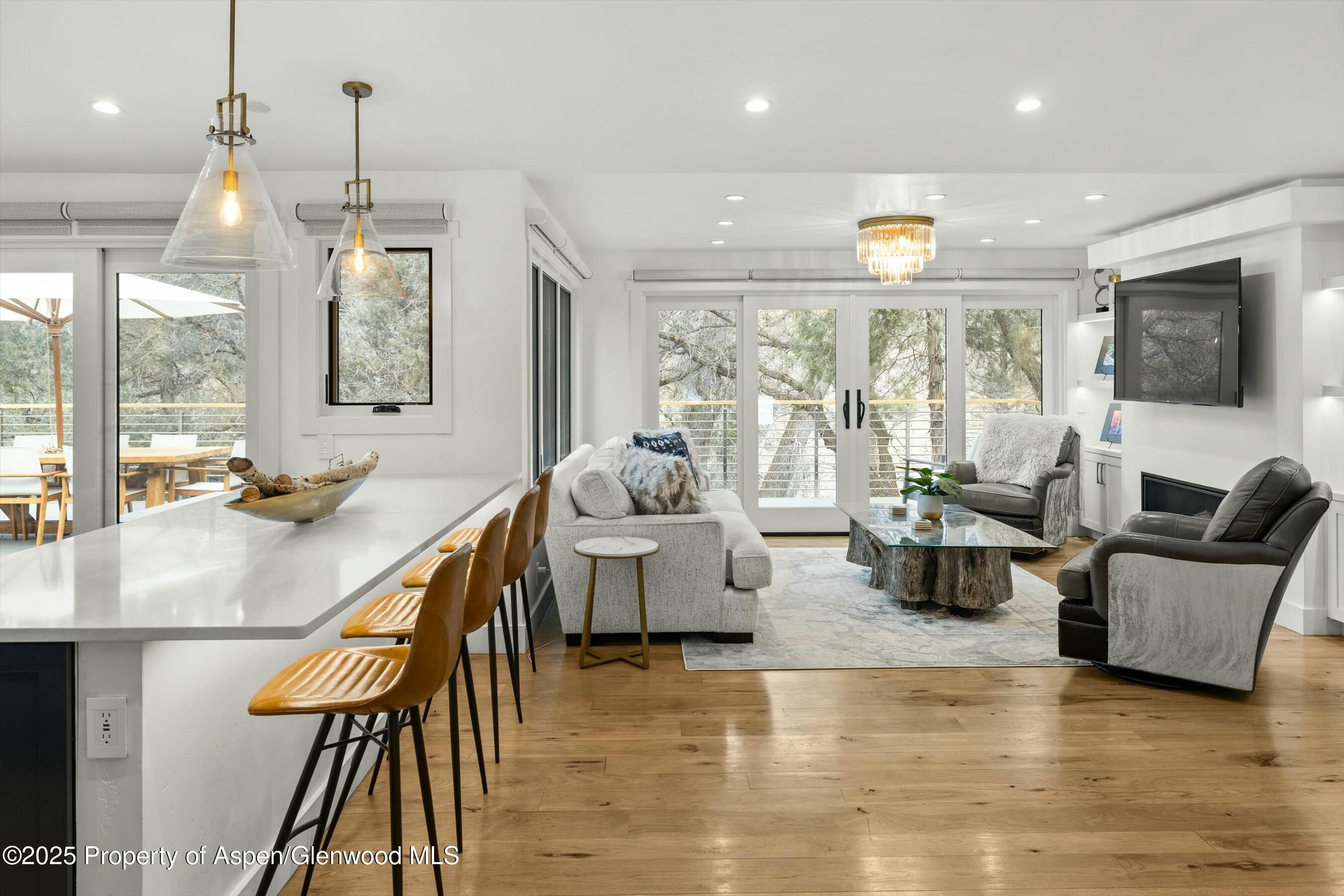 1631 Emma Spur Basalt, CO 81621 - Photo 14 of 52 a living room with furniture and a flat screen tv