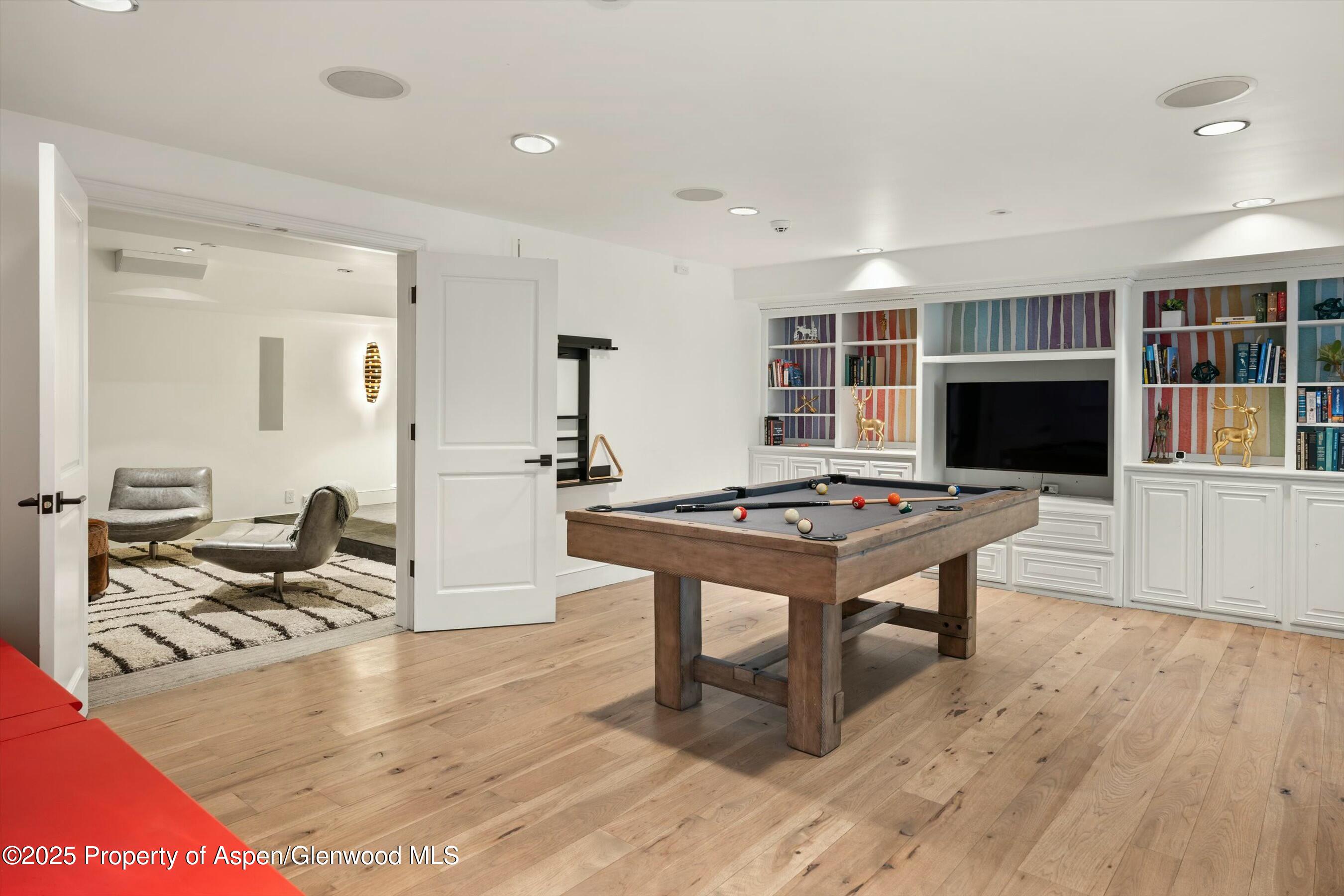 1631 Emma Spur Basalt, CO 81621 - Photo 33 of 52 a living room with furniture a rug and a flat screen tv