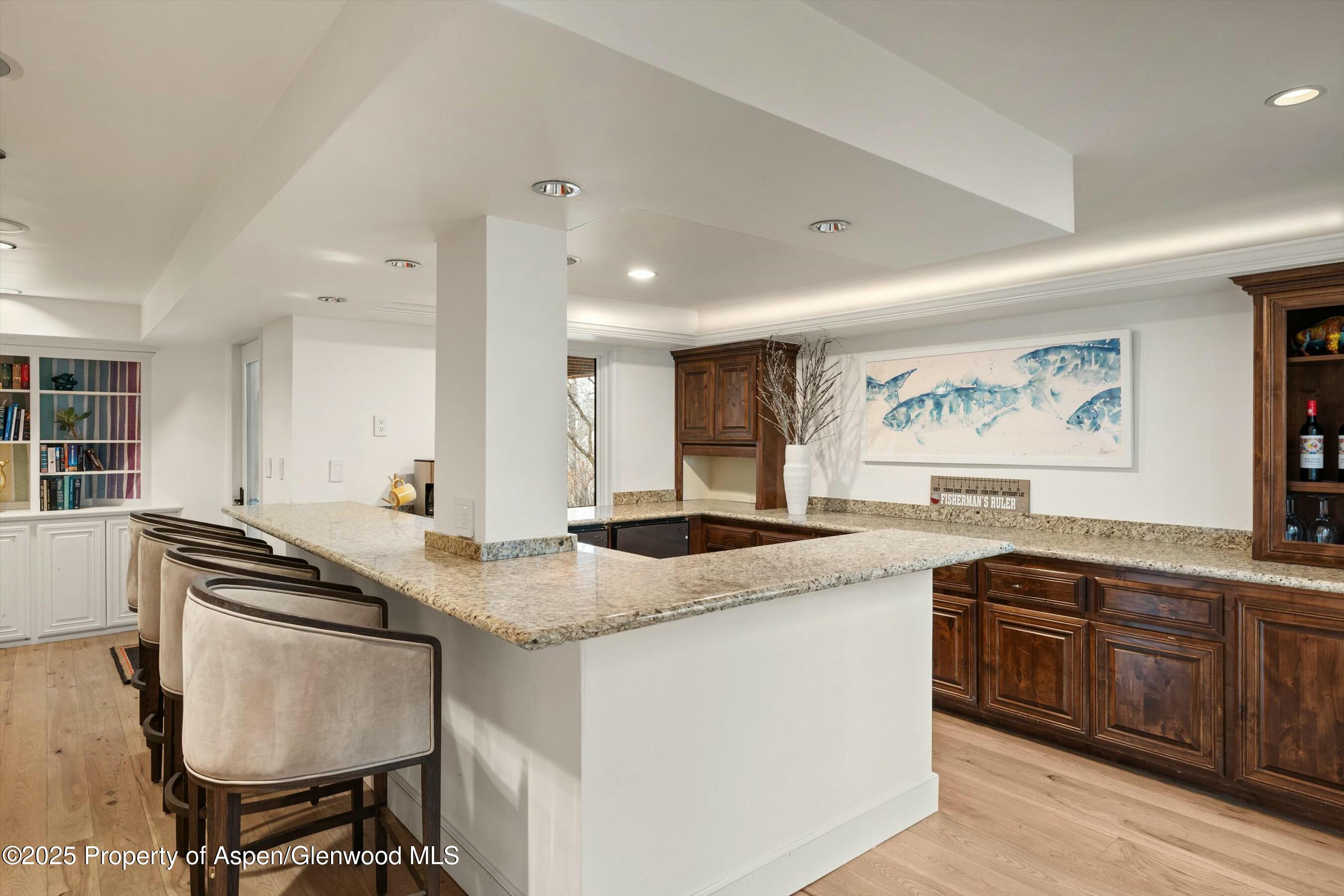 1631 Emma Spur Basalt, CO 81621 - Photo 34 of 52 a kitchen with stainless steel appliances granite countertop a stove a sink and a refrigerator