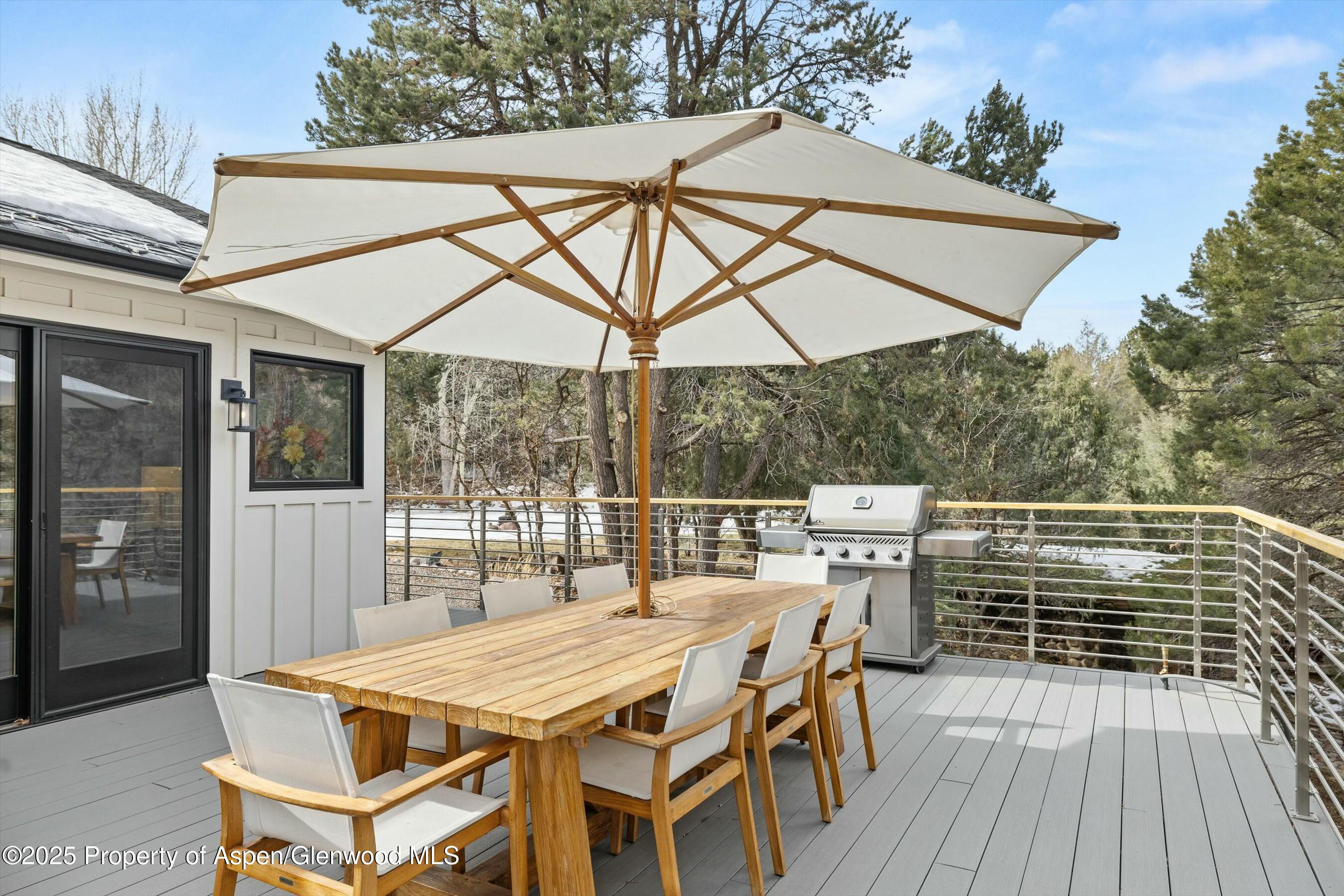 1631 Emma Spur Basalt, CO 81621 - Photo 40 of 52 a terrace with outdoor seating and wooden floor