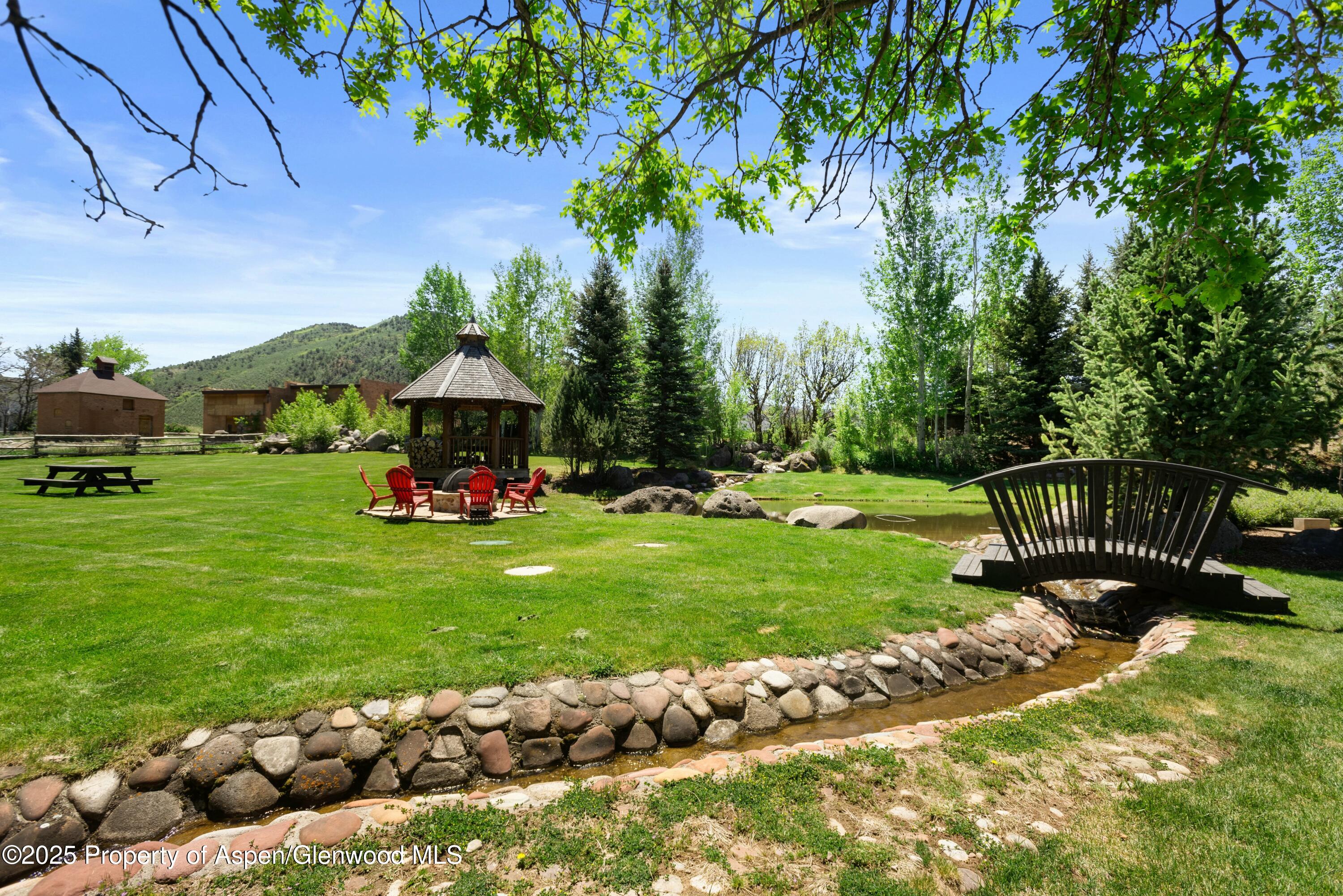 1631 Emma Spur Basalt, CO 81621 - Photo 47 of 52 a view of a chair and tables in the garden