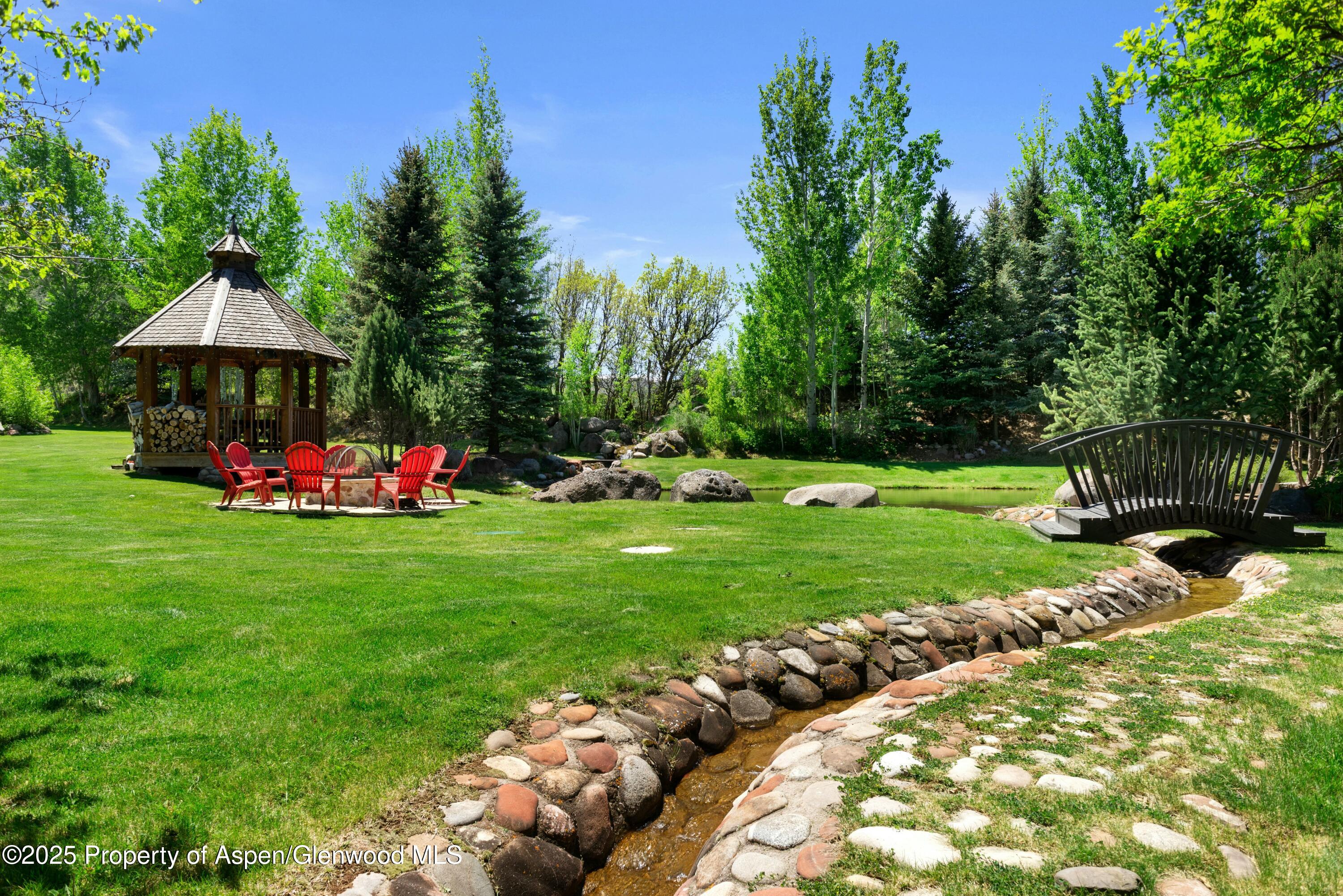 1631 Emma Spur Basalt, CO 81621 - Photo 6 of 52 a front view of a house with garden