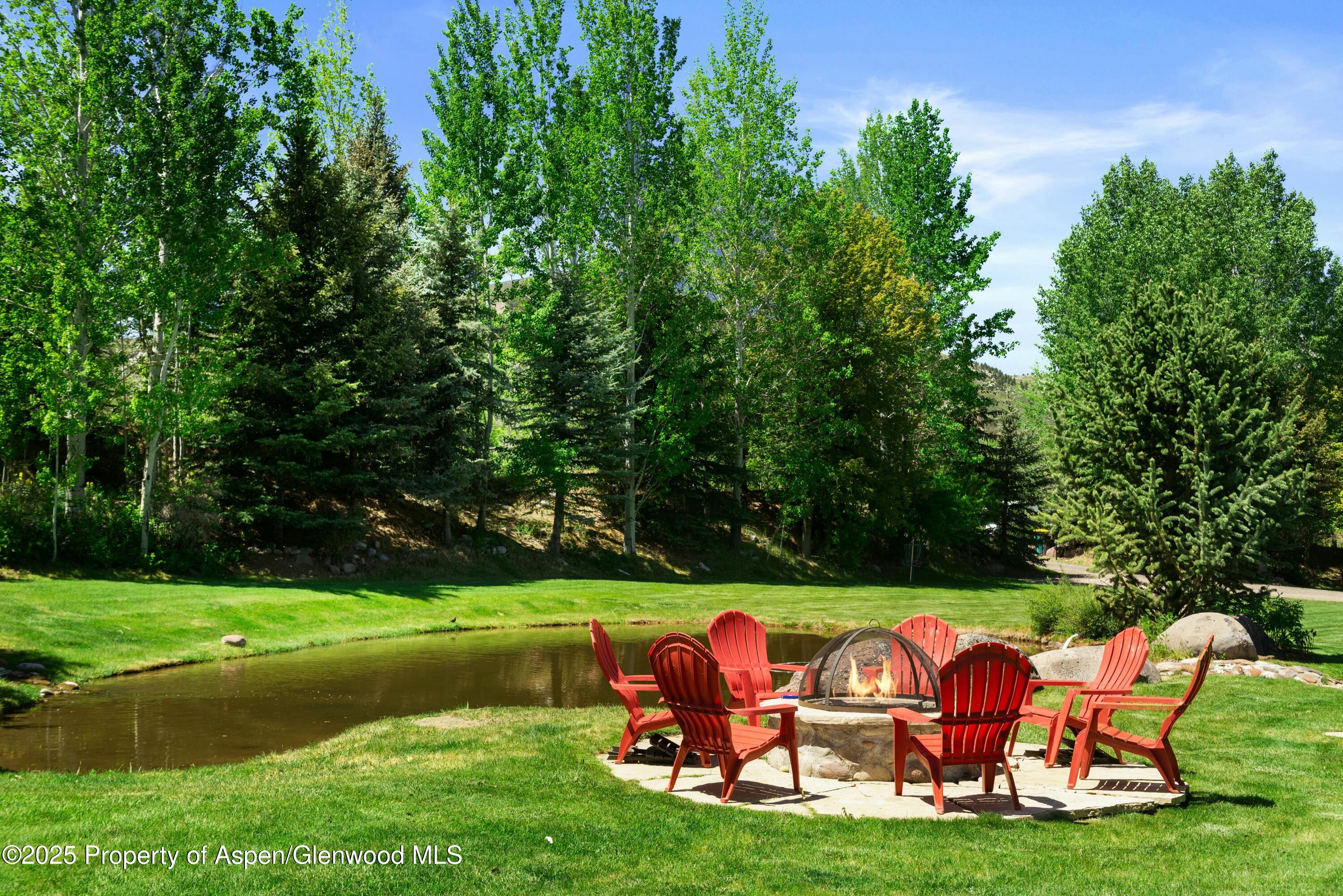 1631 Emma Spur Basalt, CO 81621 - Photo 9 of 52 a view of a golf course with chairs