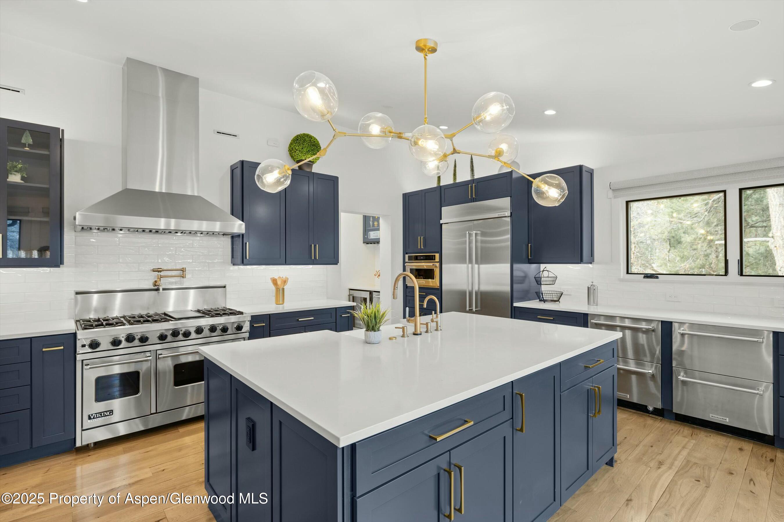 1631 Emma Spur Basalt, CO 81621 - Photo 10 of 52 a kitchen with a stove a sink and a refrigerator