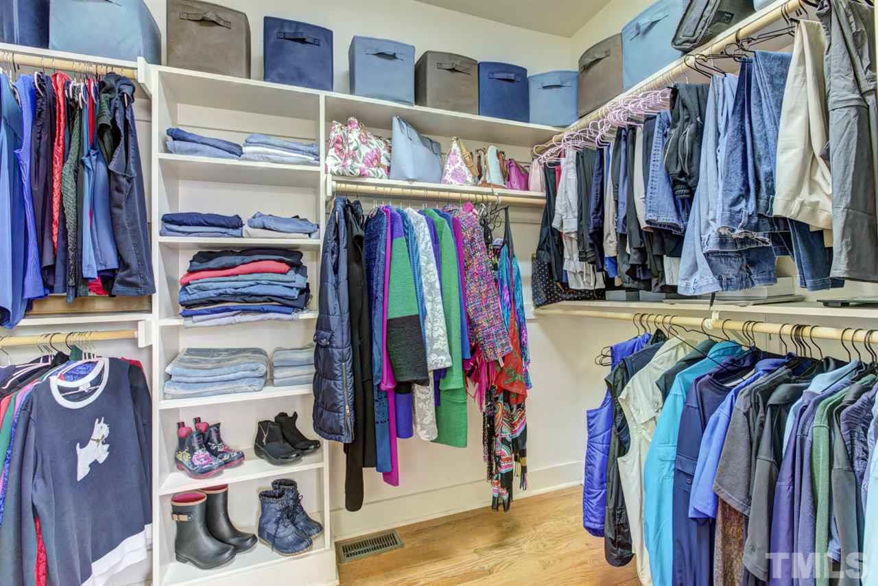 4609 Swordfish Drive Raleigh, NC 27603 - Photo 13 of 30 a view of walk in closet with clothes and shoes