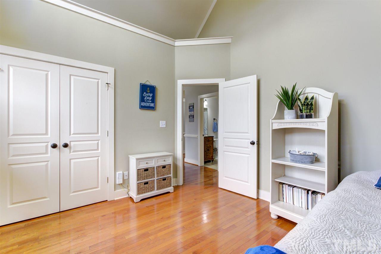 4609 Swordfish Drive Raleigh, NC 27603 - Photo 18 of 30 a living room with furniture and a wooden floor