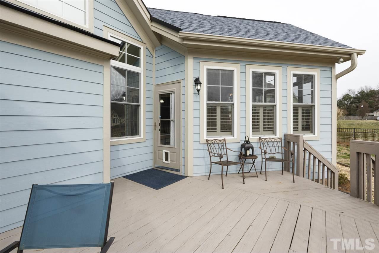 4609 Swordfish Drive Raleigh, NC 27603 - Photo 24 of 30 a balcony with furniture and a window