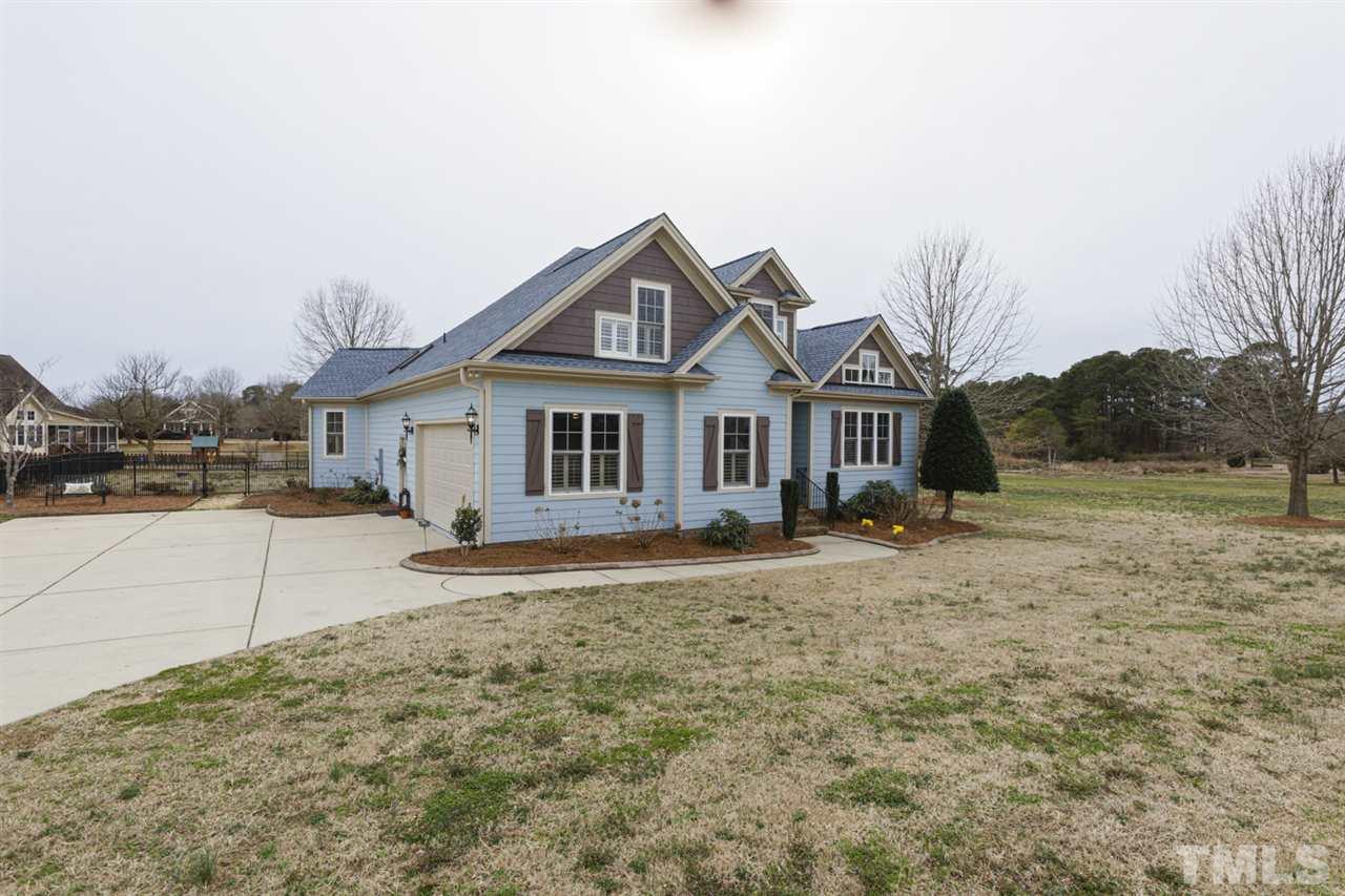 4609 Swordfish Drive Raleigh, NC 27603 - Photo 26 of 30 a view of a house with a yard