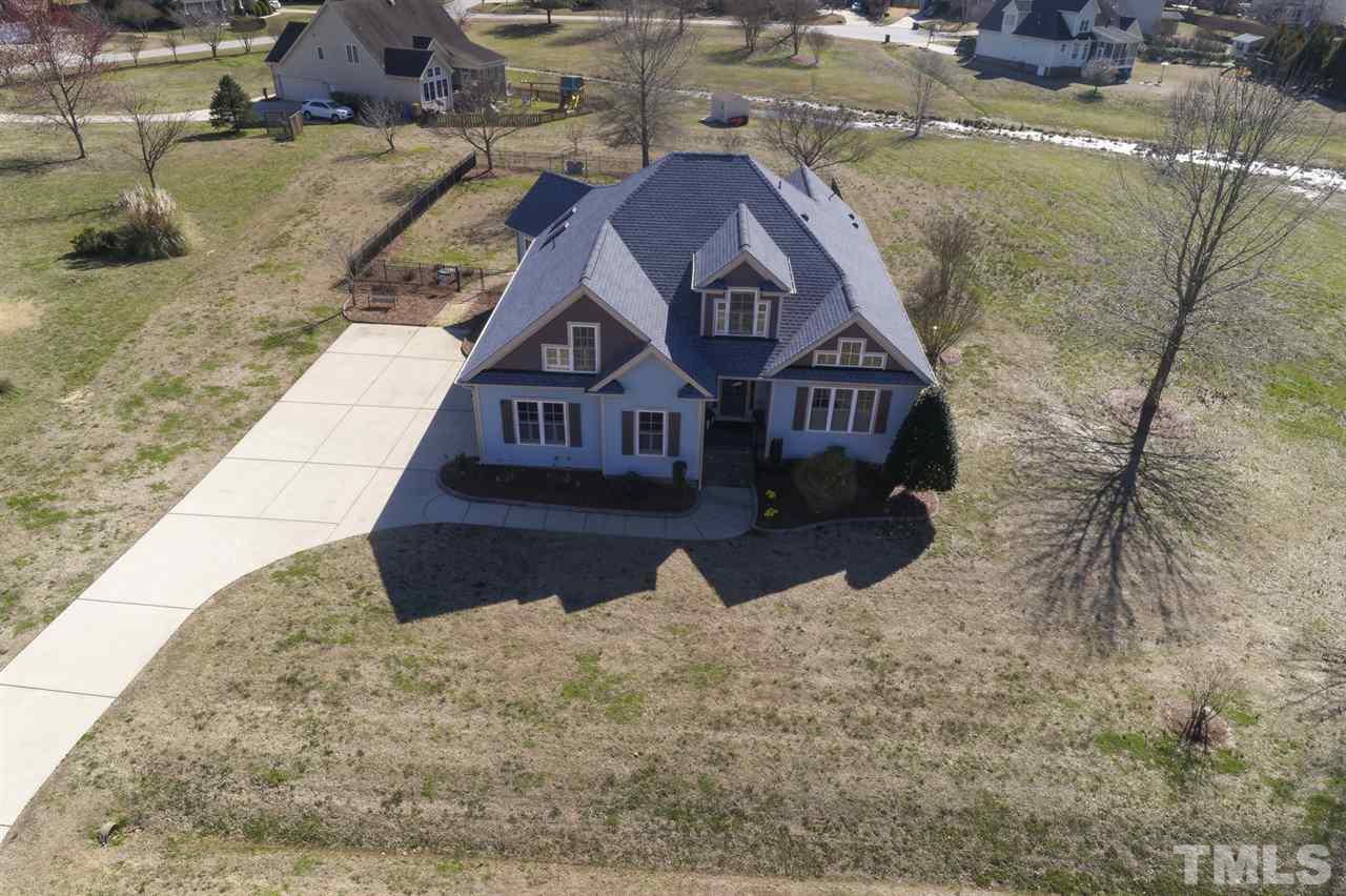 4609 Swordfish Drive Raleigh, NC 27603 - Photo 29 of 30 a view of a house with a yard