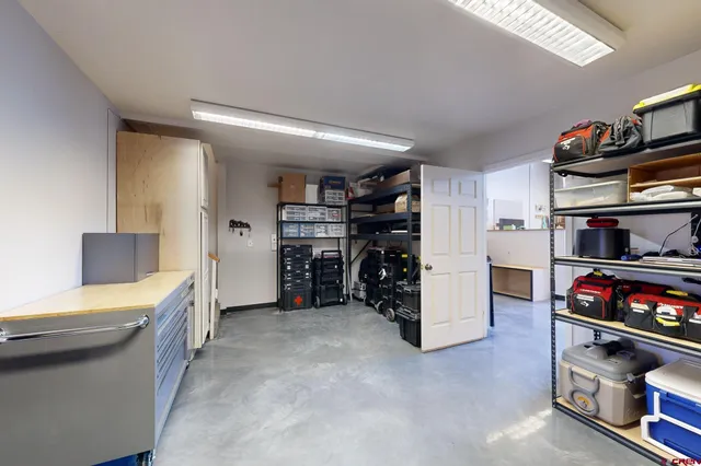 a room with a table and chairs