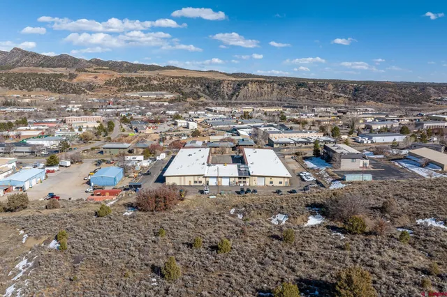 a view of a room that has a bed and toys in it