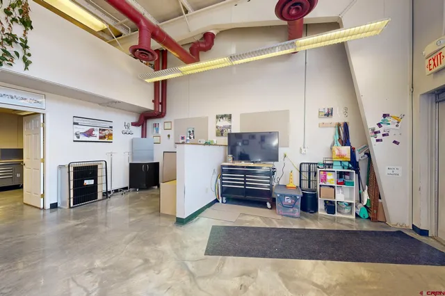 a room with furniture and a window