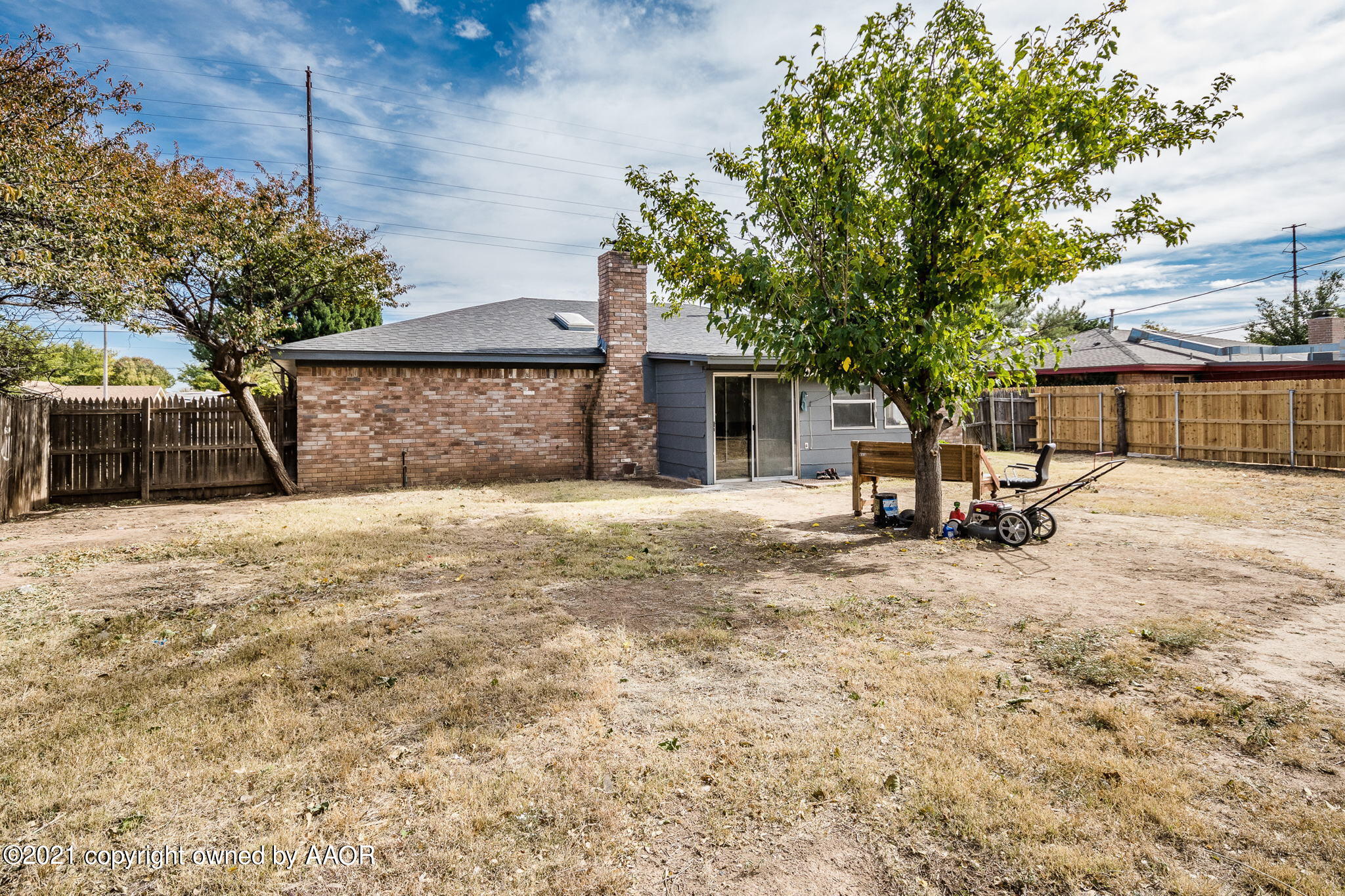 4914 South Georgia Street Amarillo, TX 79110 - Photo 15 of 19 a view of a house with a yard