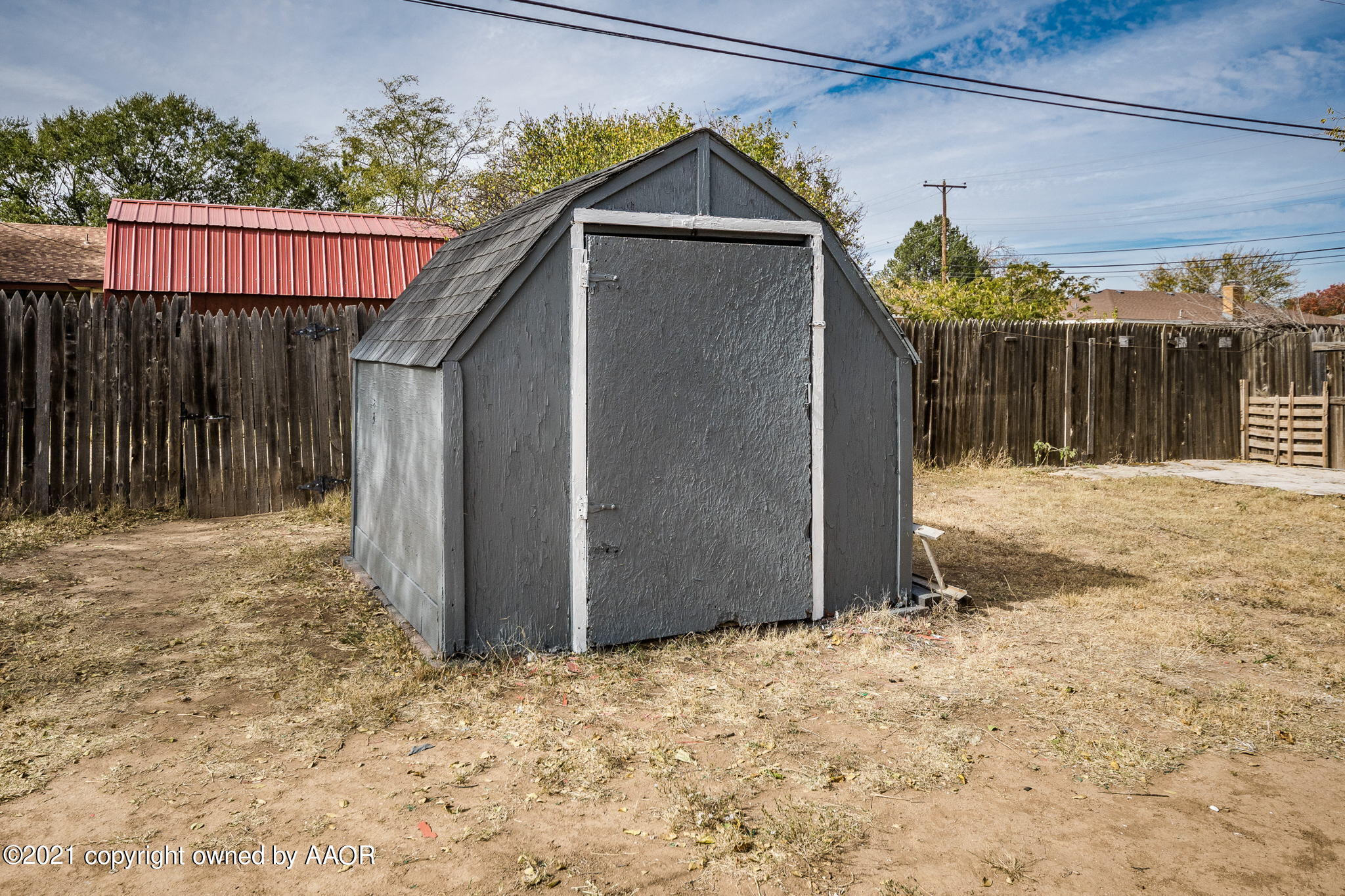 4914 South Georgia Street Amarillo, TX 79110 - Photo 18 of 19 a backyard of a house