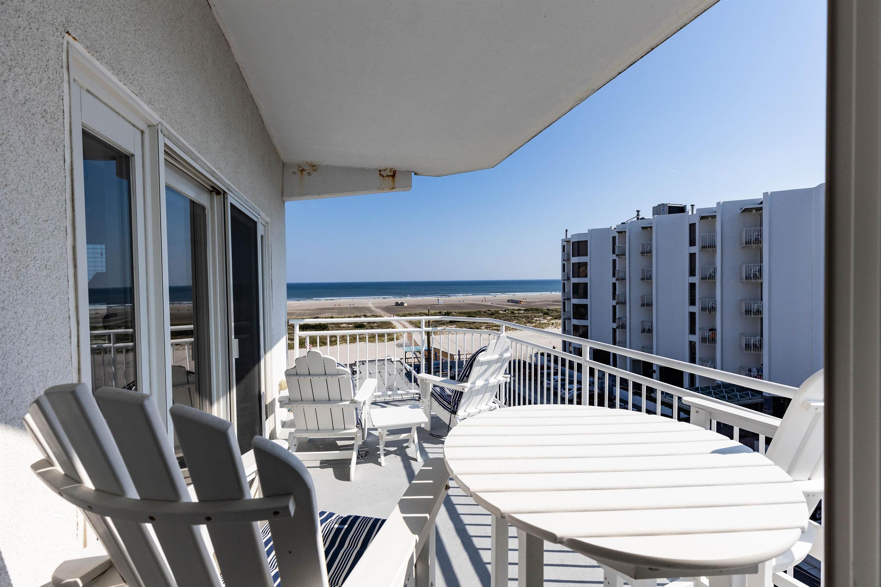 503 East Stanton Road, Unit 403 Wildwood Crest, NJ 08260 - Photo 11 of 42 a view of a dining room with furniture