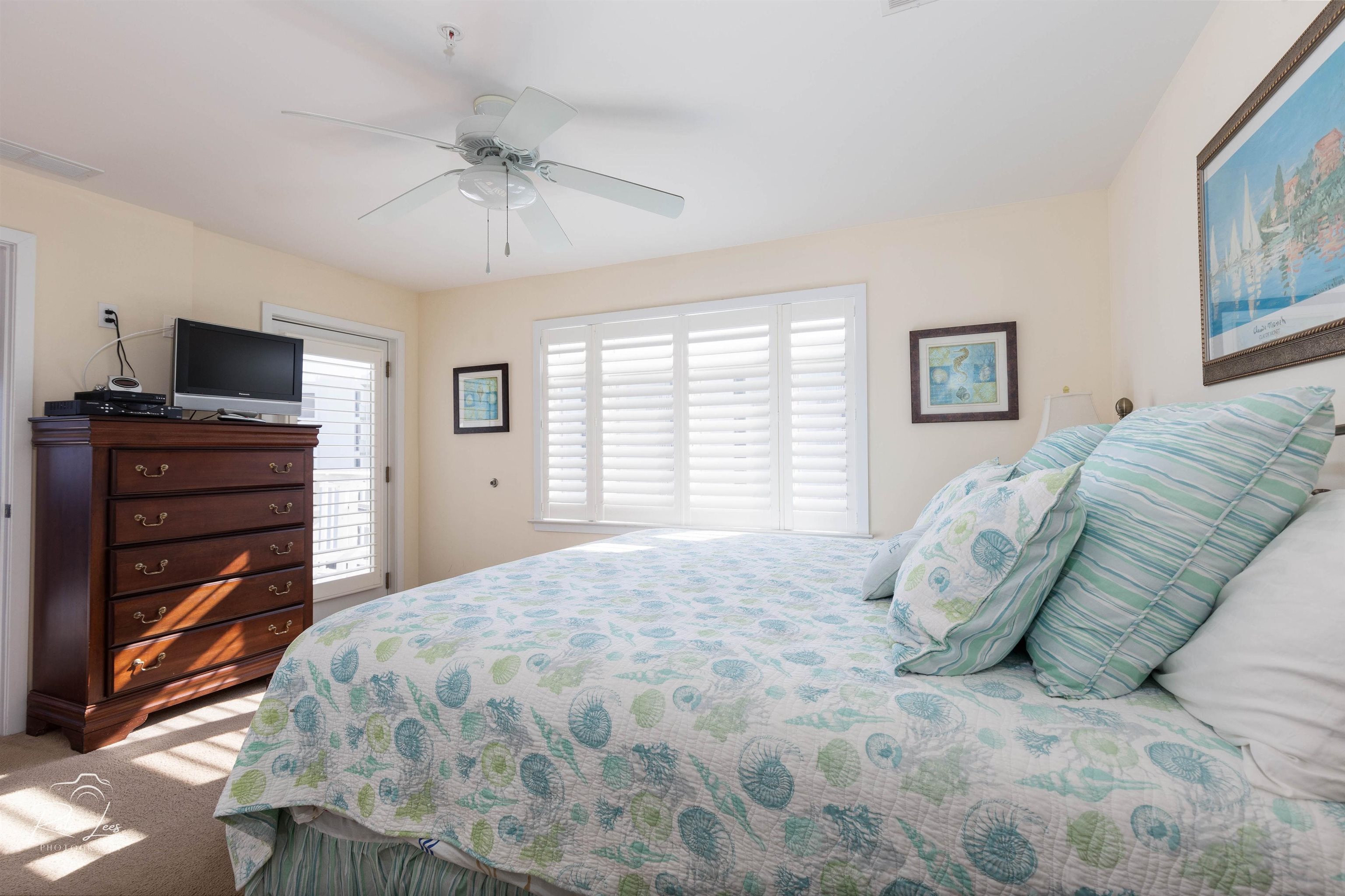 503 East Stanton Road, Unit 403 Wildwood Crest, NJ 08260 - Photo 18 of 42 a bedroom with a bed and a flat screen tv
